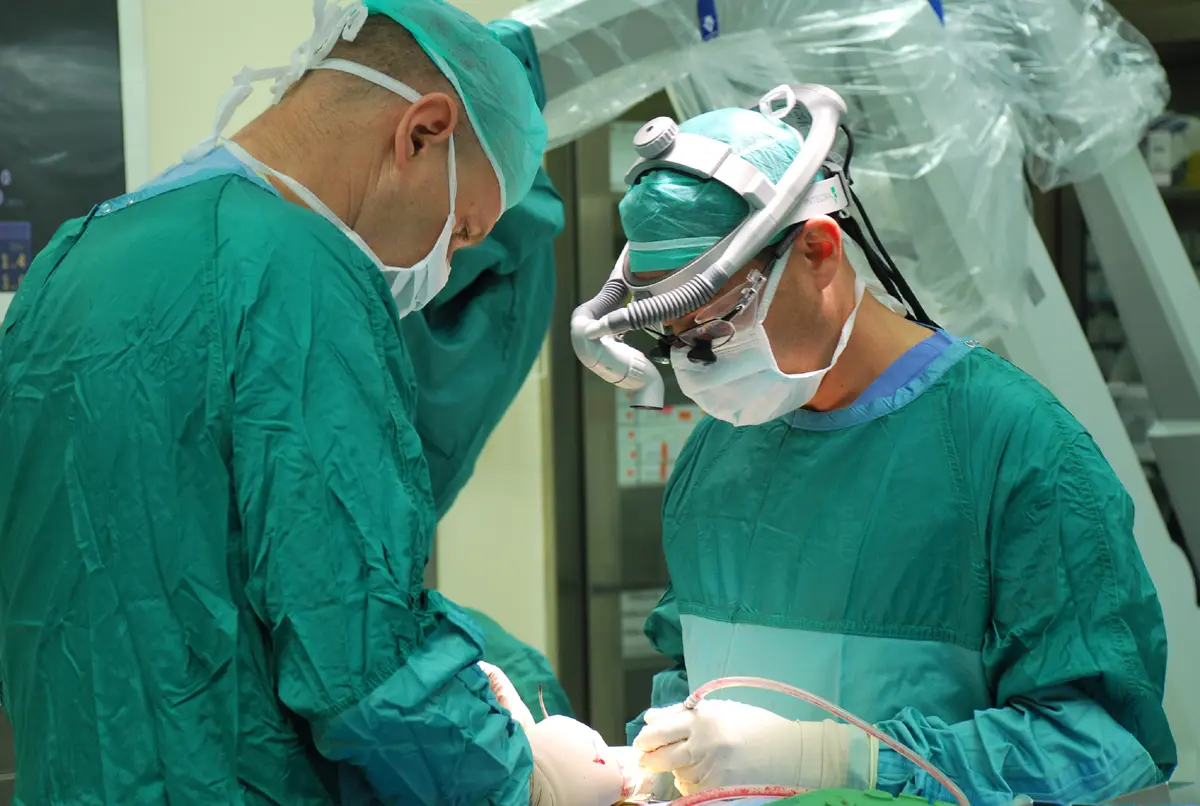 Neurosurgery team performing a complex procedure using advanced visualization